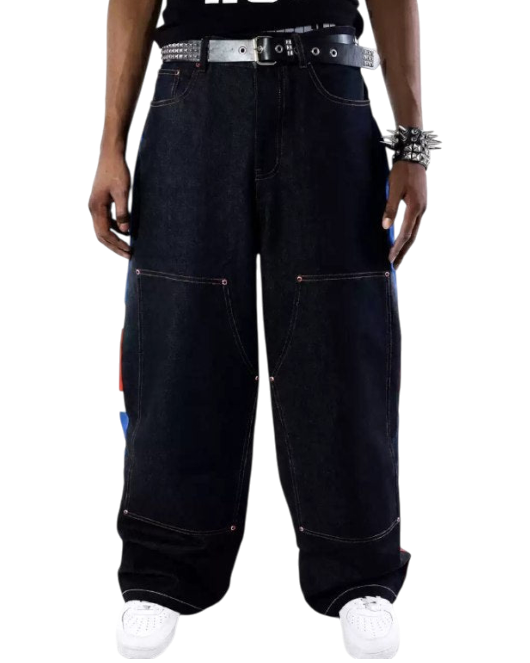 Baggy dark denim pants with panel seams and red topstitching, worn with belt