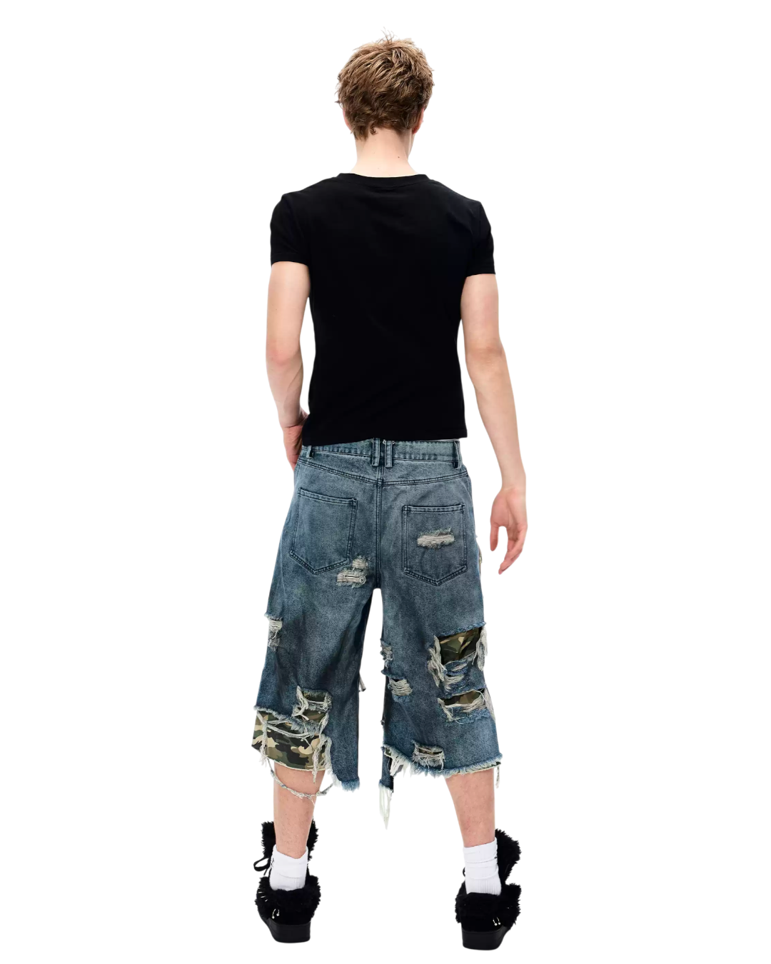 Back view distressed patchwork denim shorts with camo patches and frayed dangling hems