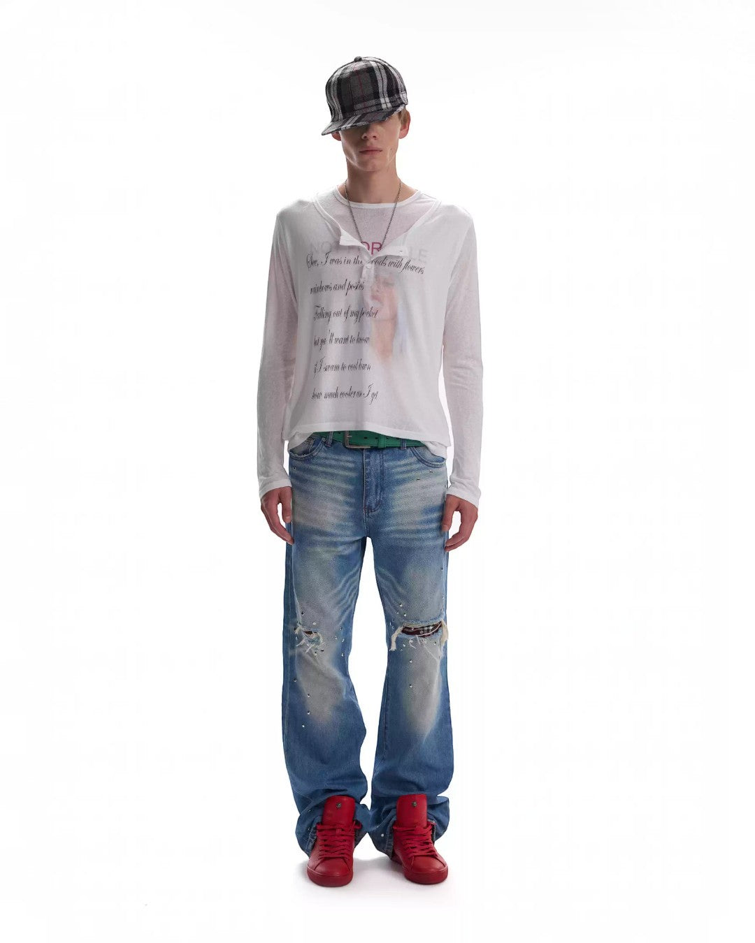 White long-sleeve top, round crew neck, center script and small text graphic.