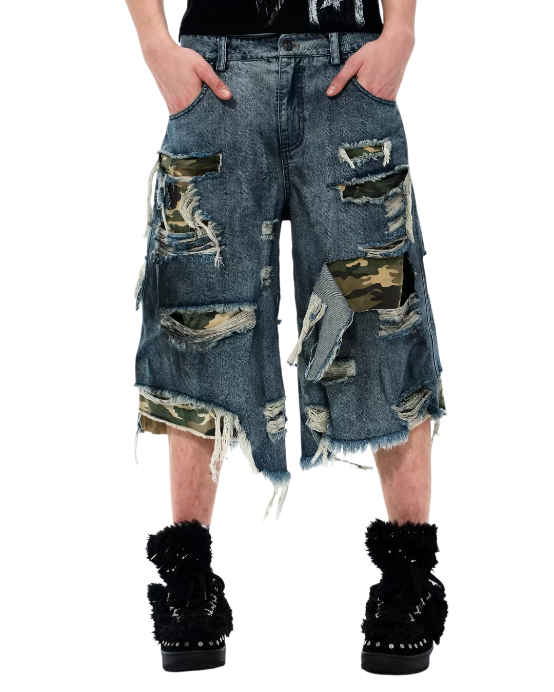 Distressed patchwork denim shorts with camo panels, frayed rips, and patch pockets