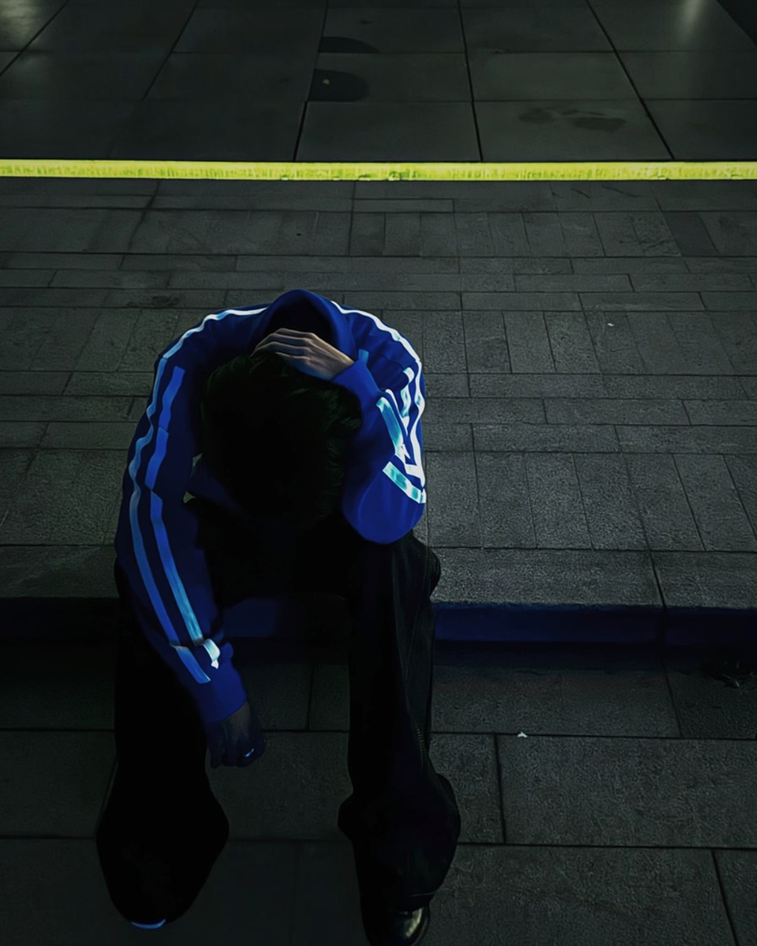 Blue hoodie with white stripe trim and hooded back panel, front pocket