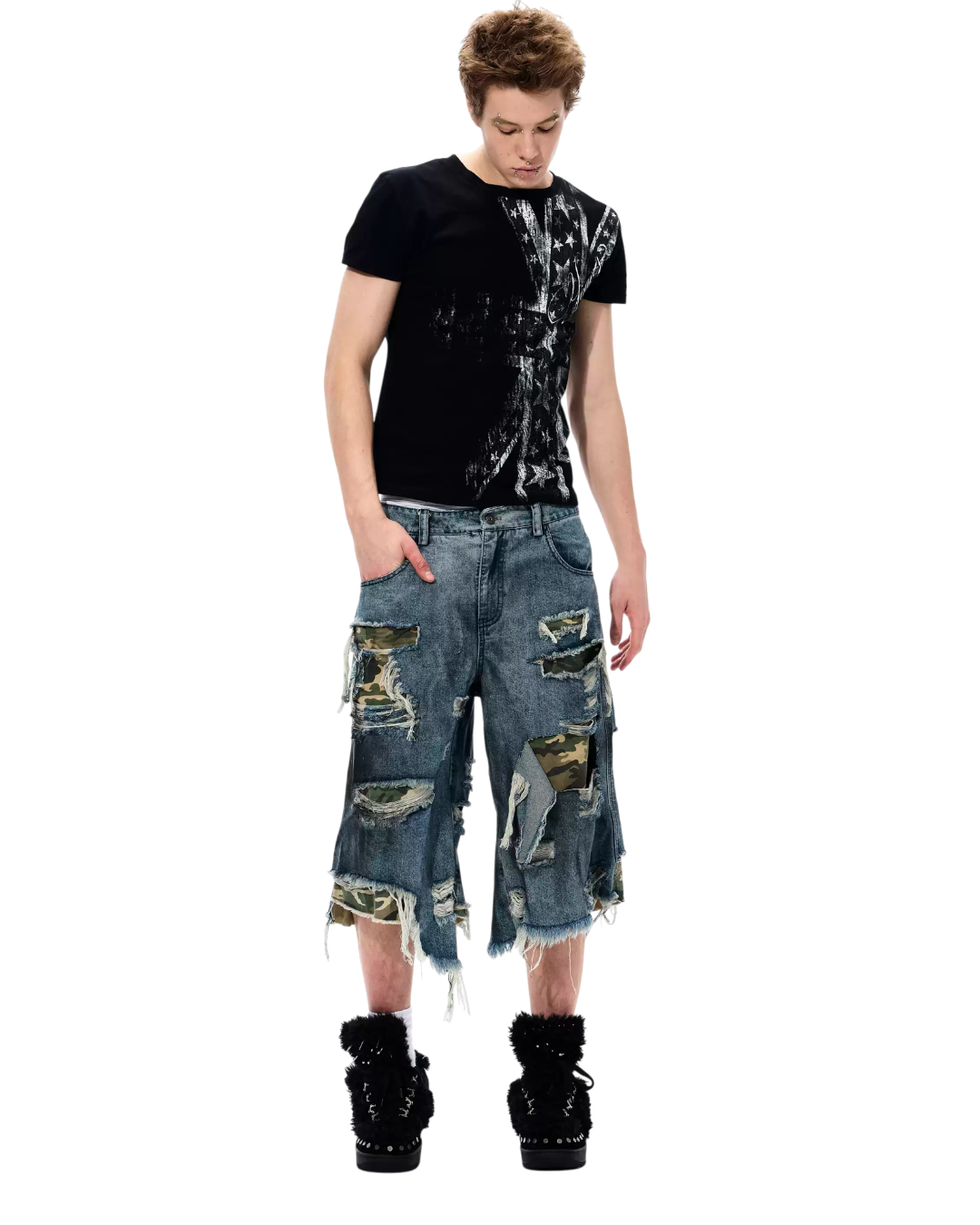 Distressed denim shorts with patchwork camo panels, ripped hem, and side pockets