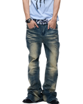 Blue skinny jeans with faded patches, whiskered thighs, and a zip-front closure