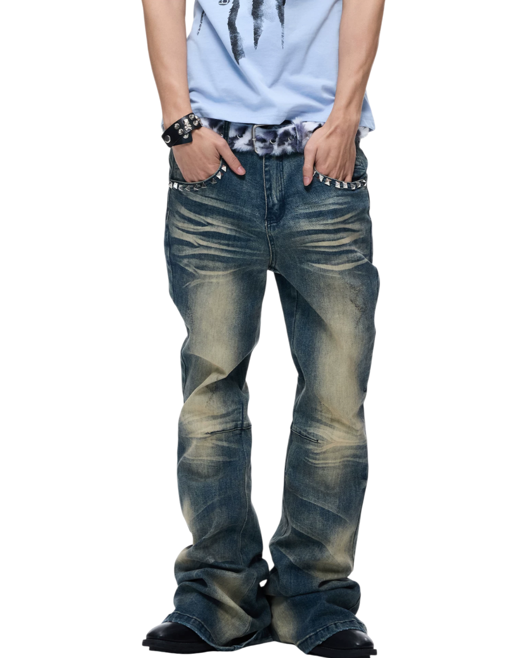 Blue skinny jeans with faded patches, whiskered thighs, and a zip-front closure