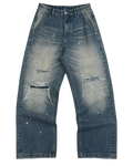 Distressed blue jeans on a white background