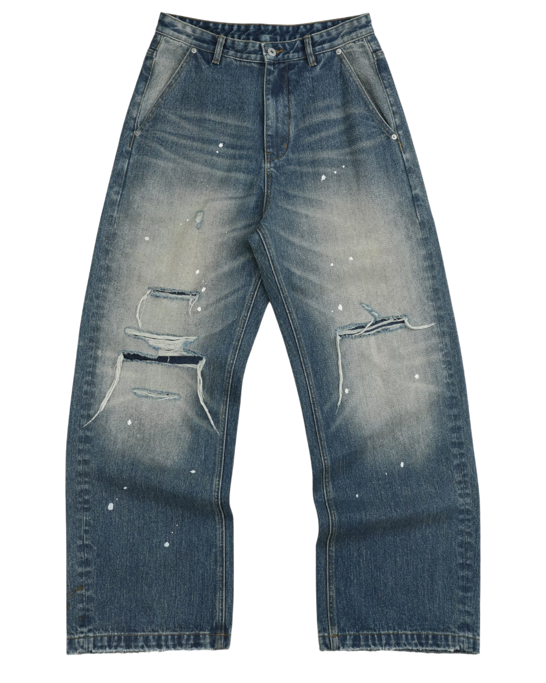 Distressed blue jeans on a white background