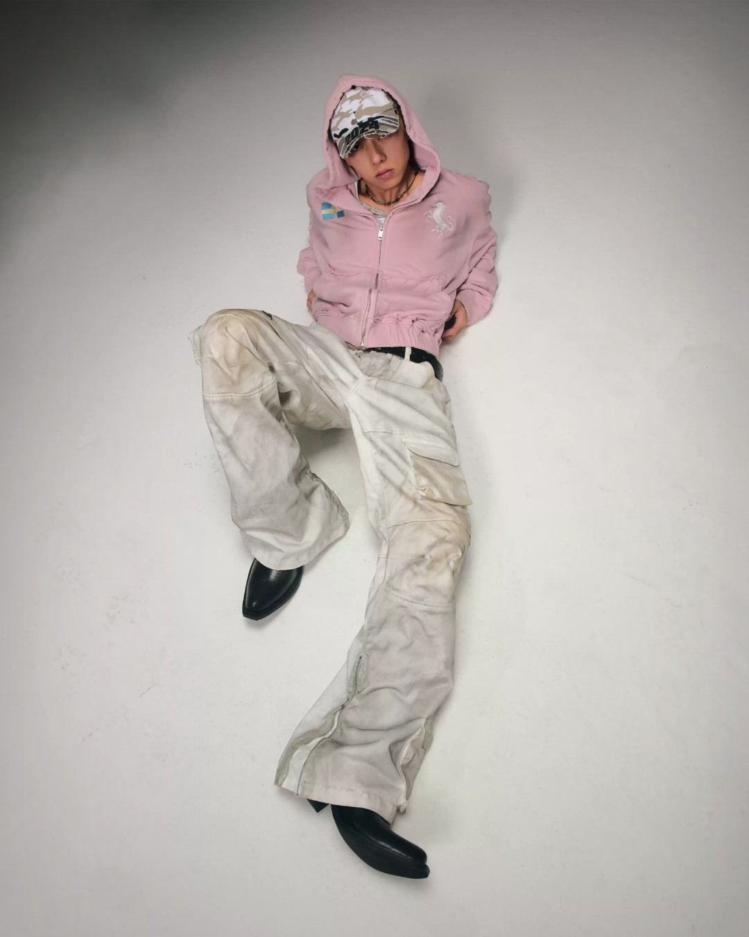 Washed zip hoodie in dusty pink, hood up, full-zip front with pockets