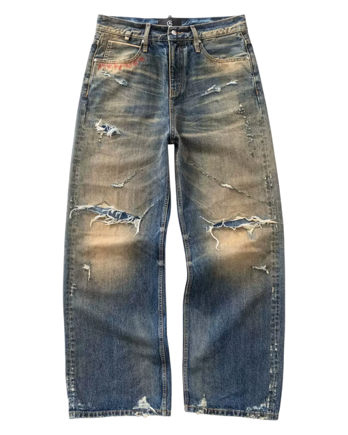 Distressed blue jeans on a white background
