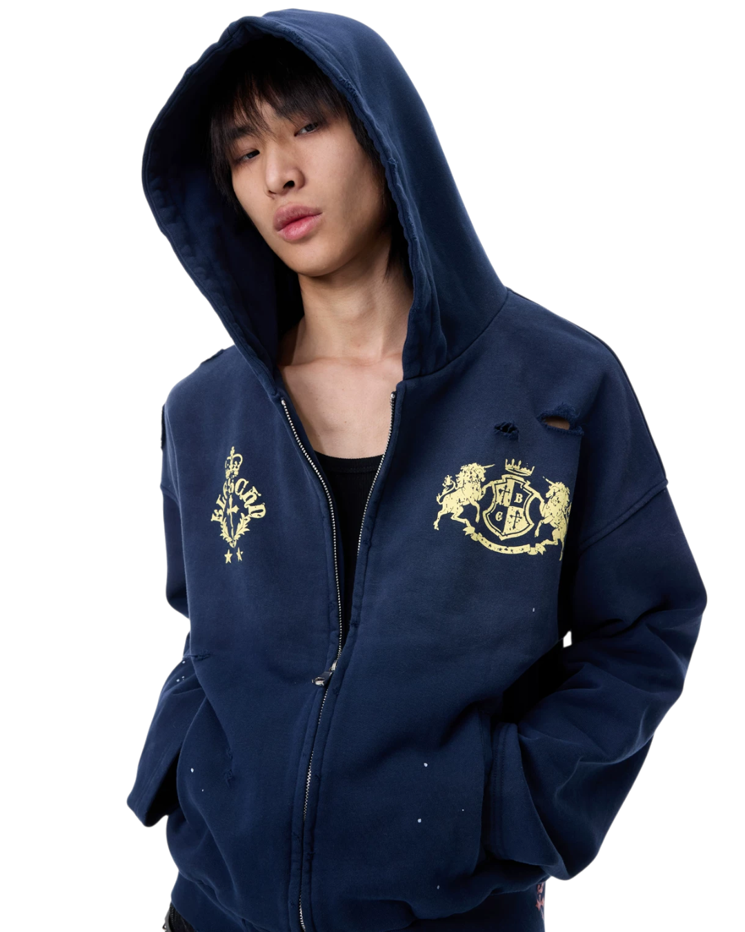 Navy hooded zip-up hoodie with gold crest patches and small sleeve distress holes