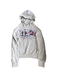 Light gray hoodie with hood and front photo graphic, kangaroo pocket detail visible.