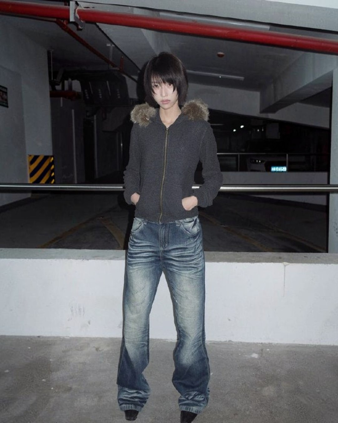 Night Lab denim jeans with faded blue wash and relaxed flared leg, mid-rise.