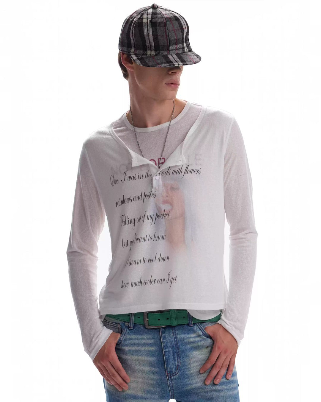 White crew-neck long-sleeve top with faded handwritten-style text print.