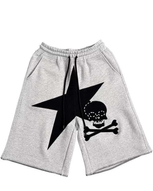 Light gray shorts with elastic waistband, black drawstring, star-and-skull graphic