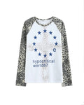 White long-sleeve top with leopard-pattern sleeves and blue star graphic, raglan style