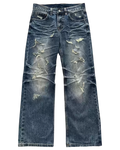Distressed blue jeans on a white background