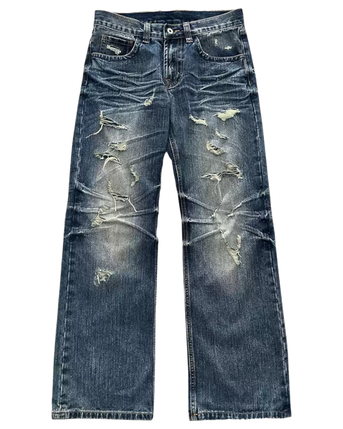 Distressed blue jeans on a white background